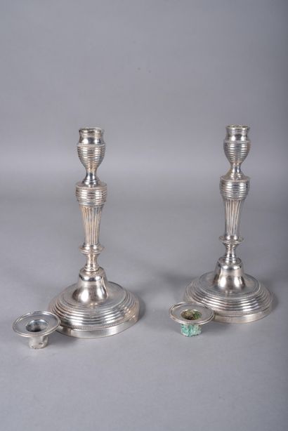 Pair of silver-plated candlesticks with tapered...