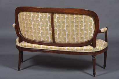 Molded and carved mahogany sofa resting on...