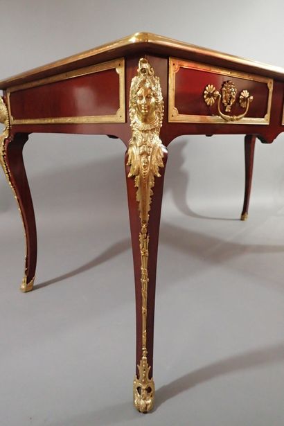 Mahogany and mahogany veneer flat desk, the...