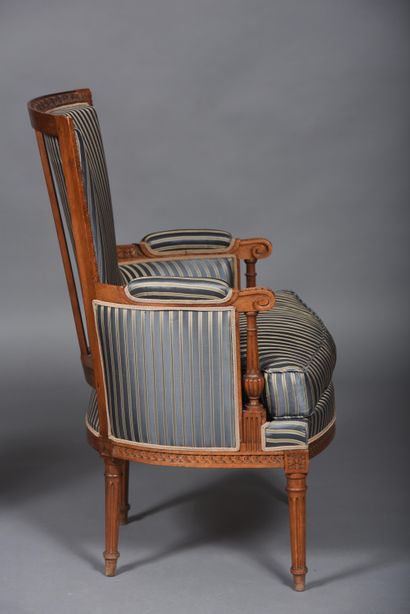 Pair of molded and carved beech bergères...