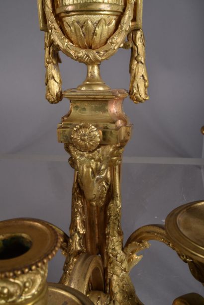 Pair of ormolu sconces with three scrolled...