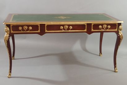 Mahogany and mahogany veneer flat desk, the...