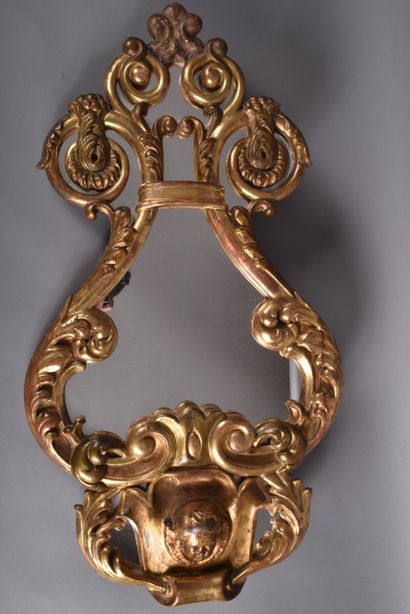 Large lyre-shaped gilded wood mirror with...