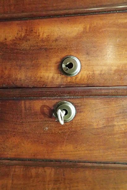Mahogany and mahogany veneer cabinet opening...