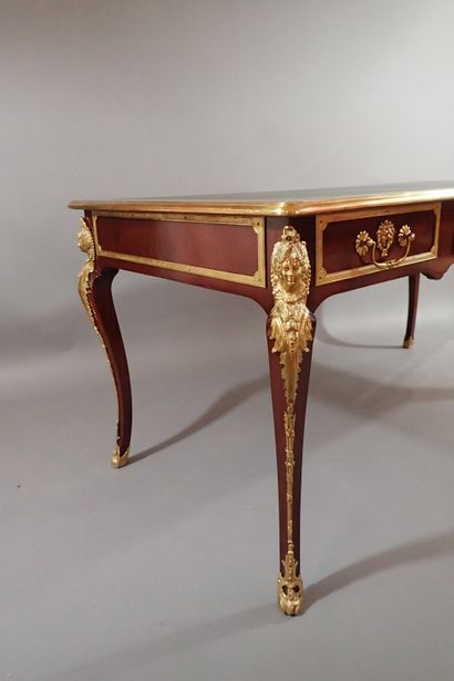 Mahogany and mahogany veneer flat desk, the...