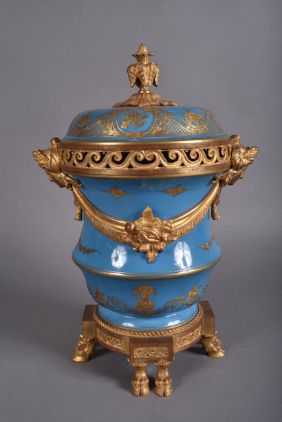A large covered perfume burner pot in celestial-blue...