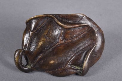 Small bronze paperweight with two frogs on...