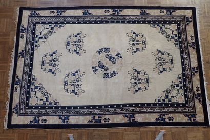 Chinese wool and silk rug in shades of white...