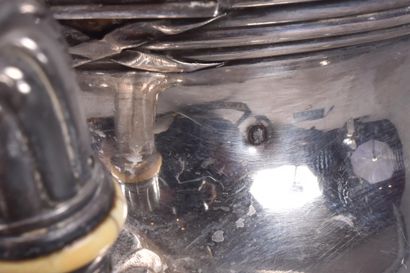 Part of a silver coffee service including...