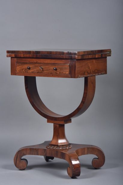 Wallet games table in rosewood veneer, revealing...