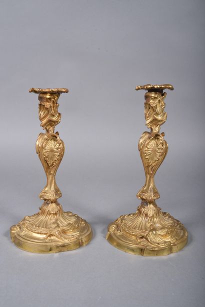Pair of ormolu candlesticks in rocaille style,...