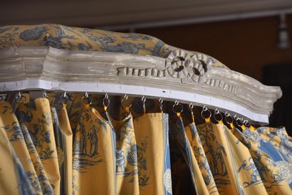 Polish-style bed in molded and carved wood...