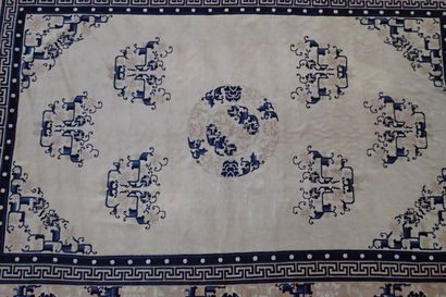 Chinese wool and silk rug in shades of white...