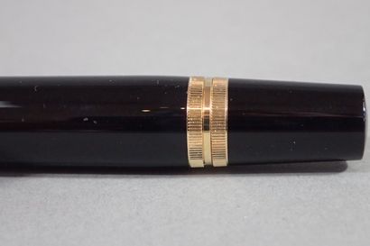 MONTBLANC. Black and orange resin fountain...