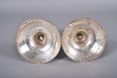 Pair of silver-plated candlesticks with tapered...