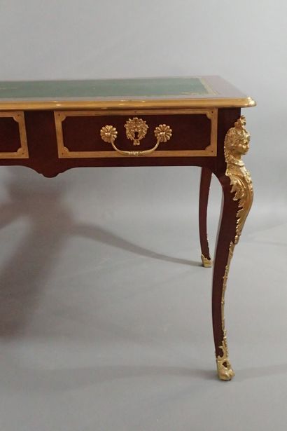 Mahogany and mahogany veneer flat desk, the...
