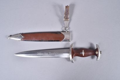 ALL. Dague mod 33. Fusée de couleur marron,...