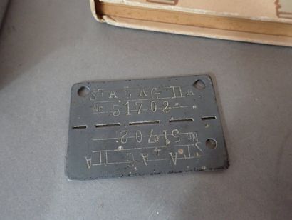 Souvenirs de prisonnier: une boite en métal...