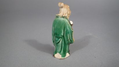 Ensemble de quatre statuettes en grès de...