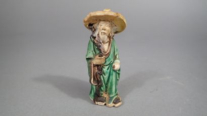 Ensemble de quatre statuettes en grès de...