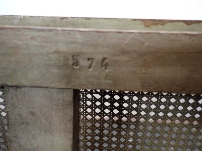 Banquette en bois et cannage reposant sur...