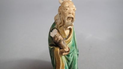 Ensemble de quatre statuettes en grès de...