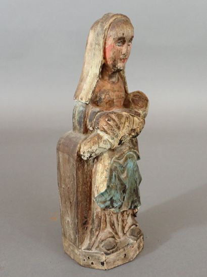 Vierge à l'Enfant en bois sculpté polychrome....