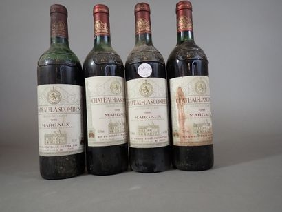 4 bouteilles comprenant 1 bouteille Château...