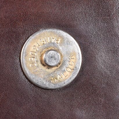 AUBERCY. Sac besace en cuir marron, anse...