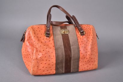 FURLA. Sac à main en cuir orange façon autruche...