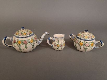 Service à thé en faience émaillée polychrome...