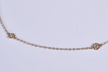 Chaine en or jaune à maille à motif d'entrelacs....