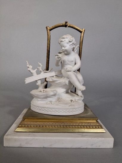 Sujet en biscuit figurant un angelot sur...