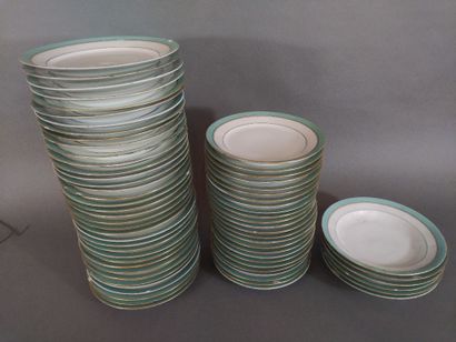 ***Service de table en porcelaine à contour...