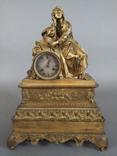 Pendule de cheminée en bronze doré à sujet...