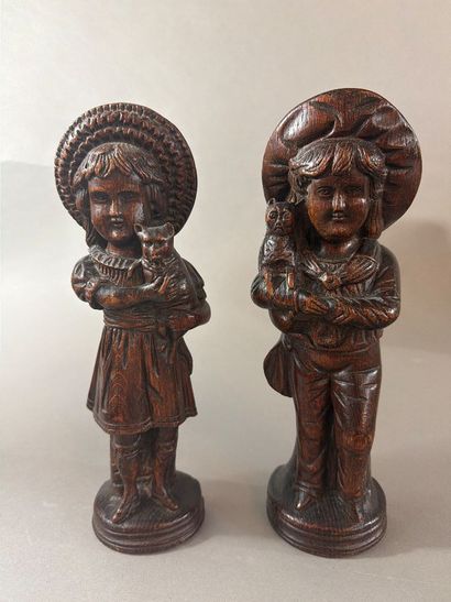 Paire de statuettes en bois de chêne sculpté,...