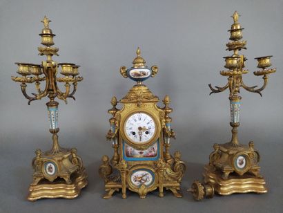 Garniture de cheminée en régule doré de style...
