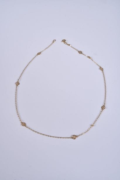 Chaine en or jaune à maille à motif d'entrelacs....