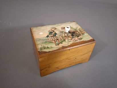Boîte à musique pour enfant en bois, le dessus...