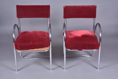 Suite de quatre fauteuils tubulaire chromé...
