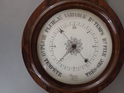Baromètre en acajou et cadran en porcelaine...