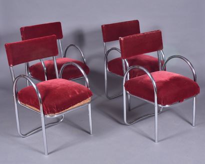 Suite de quatre fauteuils tubulaire chromé...