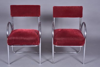Suite de quatre fauteuils tubulaire chromé...