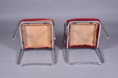 Suite de quatre fauteuils tubulaire chromé...