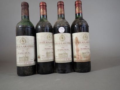 4 bouteilles comprenant 1 bouteille Château...