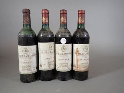 4 bouteilles comprenant 1 bouteille Château...