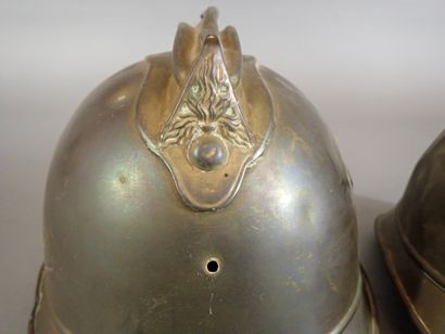 Deux casques de pompier modèle 1895 en laiton,...
