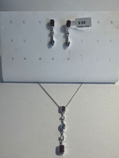 LOTUS - Parure en argent 925‰ comprenant...