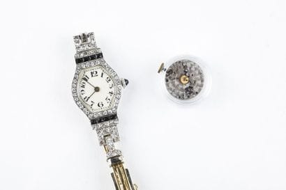 Turtle-shaped wristwatch in platinum, articulated...