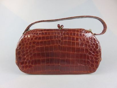 Vintage bag with brown crocodile style handle...